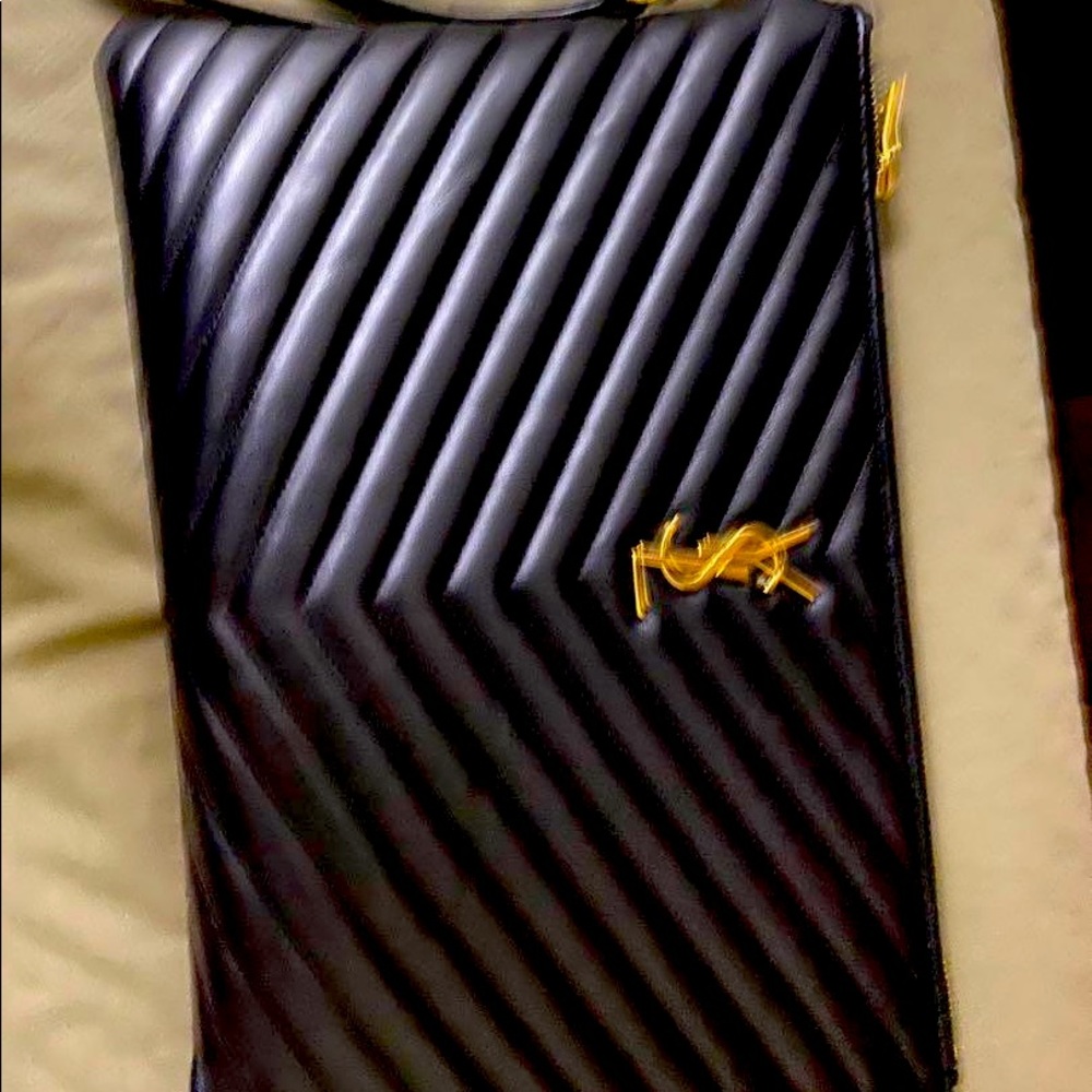 Used YSL black clutch